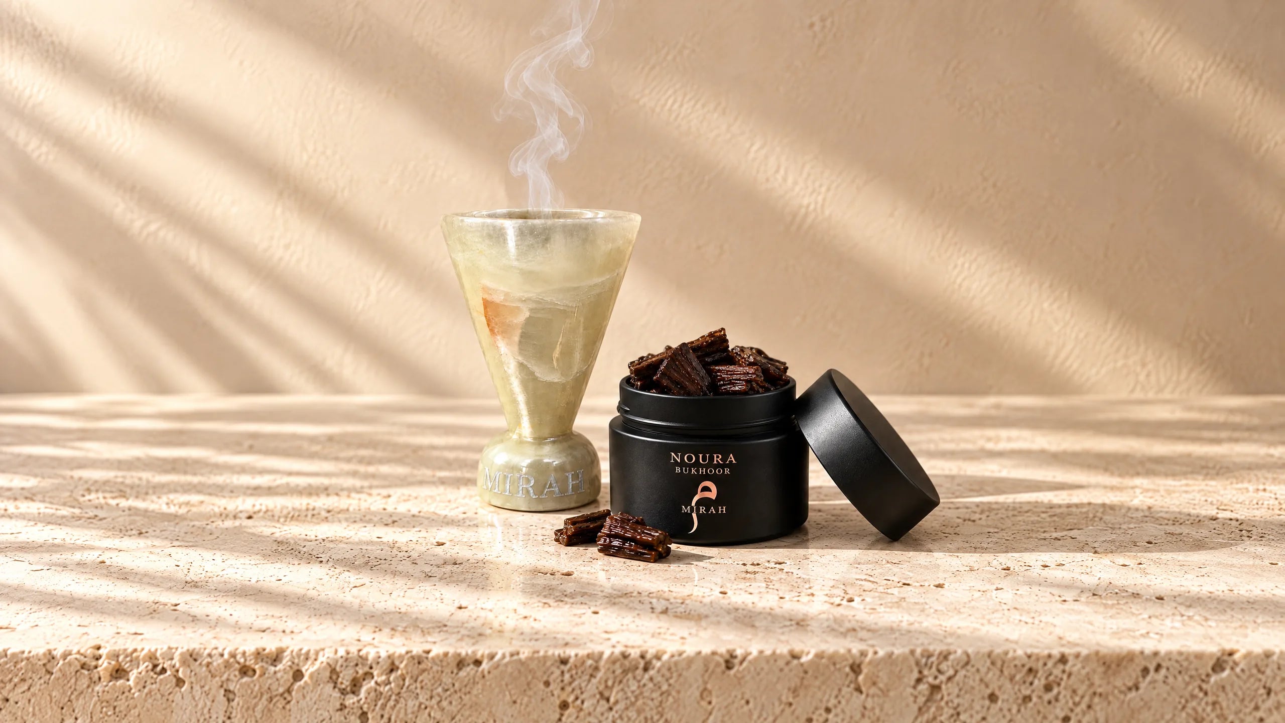 Noura Bukhoor beside a green onyx marble burner