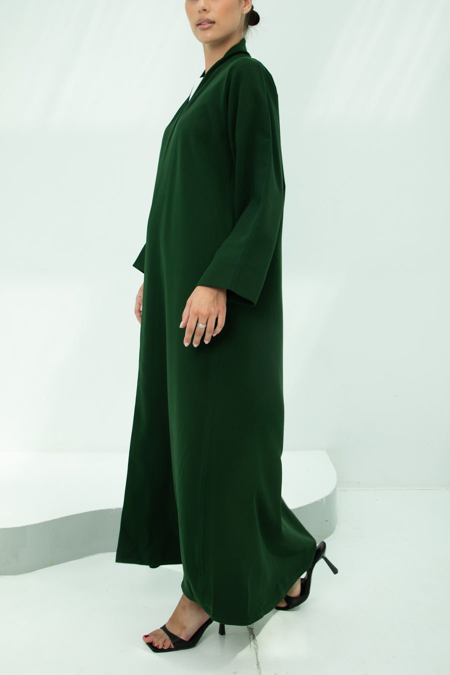 Chic Green Abaya with Exposed Stitch Detailing